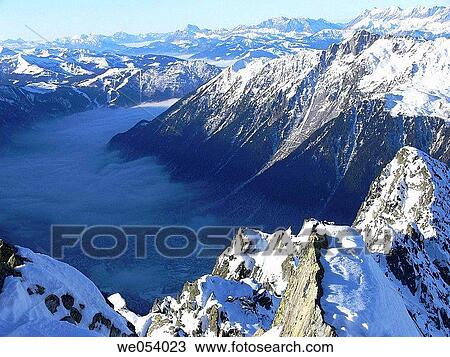 Chamonix valley as seen from cable car. Chamonix, Haute-Savoie, France View Large Photo Image Stock Image - Chamonix valley as seen from cable car. Chamonix, Haute-Savoie, France. Fotosearch