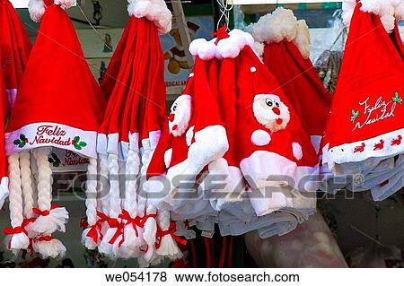 Christmas hats. Fira de Santa Ll·cia, Barcelona, Catalonia, Spain View Large Photo Image Stock Photo - Christmas hats. Fira de Santa Ll·cia, Barcelona, Catalonia, Spain. Fotosearch
