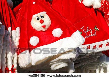 Christmas hats. Fira de Santa Ll·cia, Barcelona, Catalonia, Spain View Large Photo Image Stock Photograph - Christmas hats. Fira de Santa Ll·cia, Barcelona, Catalonia, Spain. Fotosearch