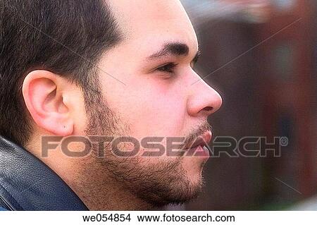 Close-up of a young Hispanic man View Large Photo Image Picture - Close-up of a young Hispanic man. Fotosearch