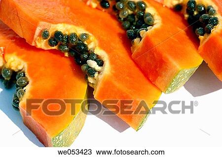 Close-up of jucy papaya slices View Large Photo Image Stock Image - Close-up of jucy papaya slices. Fotosearch
