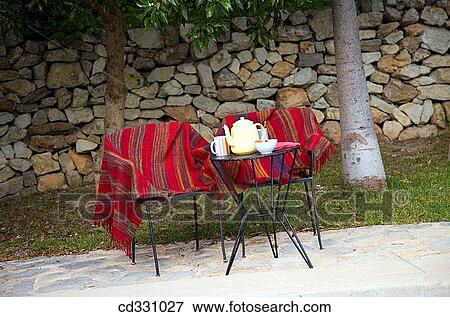 Stock Photo - coffee, absent, chair, calm, blanket, absence. Fotosearch