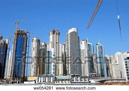 Expansion of the city: ambitious residential projects. Emirate of Dubai. United Arab Emirates on the Persian Gulf. View Large Photo Image Stock Image - Expansion of the city: ambitious residential projects. Emirate of Dubai. United Arab Emirates on the Persian Gulf.. Fotosearch