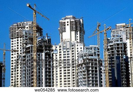 Expansion of the city: ambitious residential projects. Emirate of Dubai. United Arab Emirates on the Persian Gulf. View Large Photo Image Stock Photography - Expansion of the city: ambitious residential projects. Emirate of Dubai. United Arab Emirates on the Persian Gulf.. Fotosearch