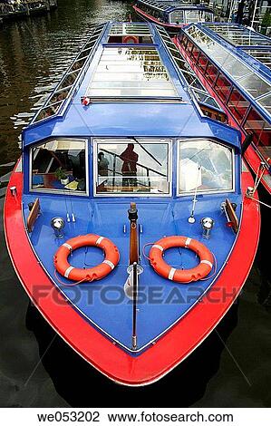 Ferries for sightseeing, ferry port near central station, Amsterdam, Holland, Netherlands View Large Photo Image Stock Image - Ferries for sightseeing, ferry port near central station, Amsterdam, Holland, Netherlands. Fotosearch