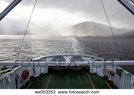 Ferry crossing Gullesfjord on island Hinnoya, Troms, Norway, Lapland, Scandinavia, Europe. Norwegian Sea, North-Atlantic View Large Photo Image Stock Image - Ferry crossing Gullesfjord on island Hinnoya, Troms, Norway, Lapland, Scandinavia, Europe. Norwegian Sea, North-Atlantic. Fotosearch