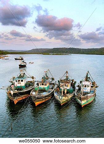 Fishing Motor boats in water at Sakhartar. Ratnagiri, Maharashtra, India. View Large Photo Image Stock Image - Fishing Motor boats in water at Sakhartar. Ratnagiri, Maharashtra, India.. Fotosearch