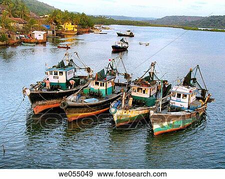 Fishing Motor boats in water at Sakhartar. Ratnagiri, Maharashtra, India. View Large Photo Image Stock Photo - Fishing Motor boats in water at Sakhartar. Ratnagiri, Maharashtra, India.. Fotosearch
