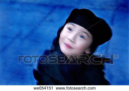 Five year old Chinese American girl, looking up smiling, wearing a hat and winter coat, evening, blurry View Large Photo Image Stock Image - Five year old Chinese American girl, looking up smiling, wearing a hat and winter coat, evening, blurry. Fotosearch