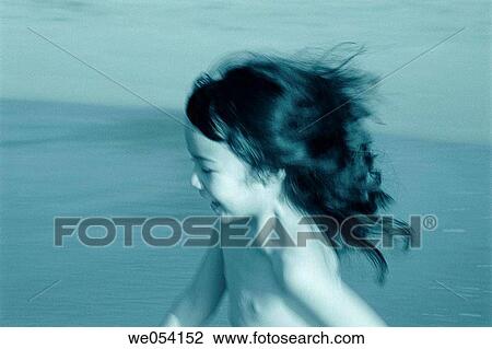 Five year old Chinese American girl, running on the beach, Hawaii, blurry motion View Large Photo Image Stock Image - Five year old Chinese American girl, running on the beach, Hawaii, blurry motion. Fotosearch