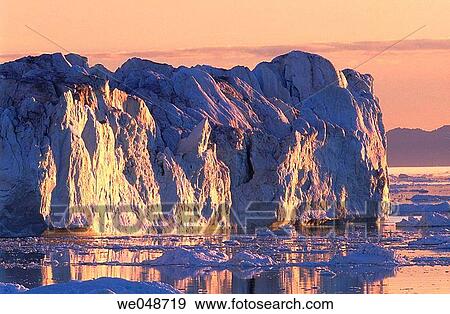 Iceberg. Midnight sun. Llulissat. Diskobay. Greenland. August. View Large Photo Image Stock Photo - Iceberg. Midnight sun. Llulissat. Diskobay. Greenland. August.. Fotosearch