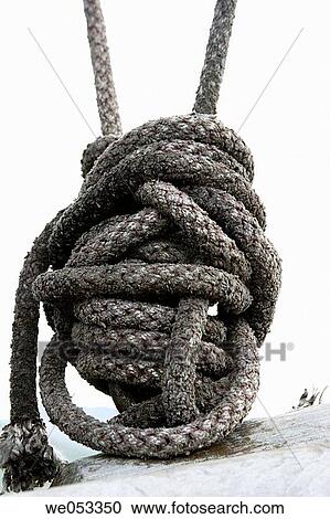 Knotted ropes. Foldvik Brygge, Gratangen commune, Troms, Norway, Scandinavia, Europe. Norwegian Sea, North-Atlantic, Sub-Arctic View Large Photo Image Stock Image - Knotted ropes. Foldvik Brygge, Gratangen commune, Troms, Norway, Scandinavia, Europe. Norwegian Sea, North-Atlantic, Sub-Arctic. Fotosearch