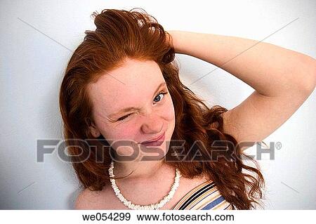 Long red_hair teen girl pulling on her hair View Large Photo Image Stock Photo - Long red_hair teen girl pulling on her hair. Fotosearch