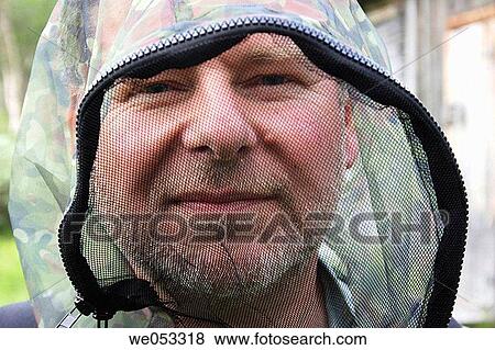 Man with net-hood to protect from midges, Lapland, Norrbotten, Sweden, Scandinavia, Europe. View Large Photo Image Stock Photo - Man with net-hood to protect from midges, Lapland, Norrbotten, Sweden, Scandinavia, Europe.. Fotosearch