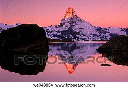 Matterhorn reflected on Riffelsee in October, Alps. Valais, Switzerland View Large Photo Image Picture - Matterhorn reflected on Riffelsee in October, Alps. Valais, Switzerland. Fotosearch