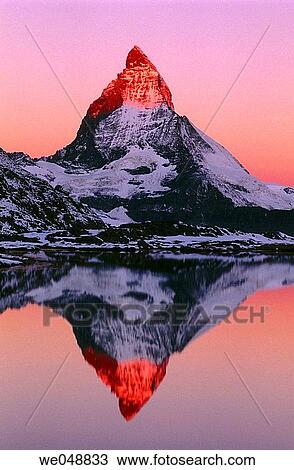 Stock Image - Matterhorn reflected on Riffelsee in October, Alps. Valais, Switzerland. Fotosearch
