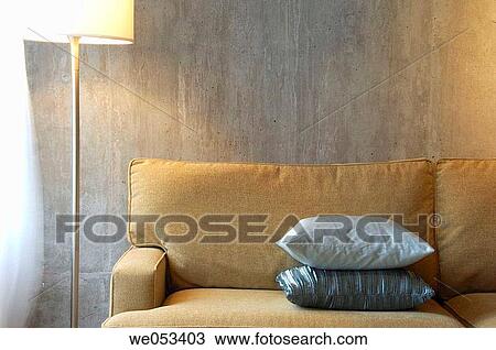 Stock Image - modern/contemporary loft interior of sofa and lamp. Fotosearch