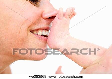 Mother Playinf with Baby Foot View Large Photo Image Stock Photo - Mother Playinf with Baby Foot. Fotosearch