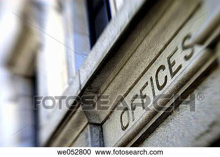 Stock Image - offices word on side of building. Fotosearch