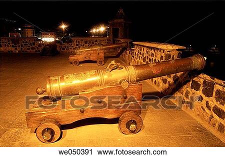 Old cannons at pier, Puerto de la Cruz. Tenerife, Canary Islands, Spain View Large Photo Image Stock Image - Old cannons at pier, Puerto de la Cruz. Tenerife, Canary Islands, Spain. Fotosearch