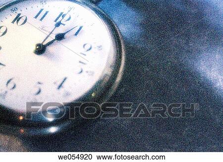 Stock Image - Pocket watch_ clock, shot on grainy film. Fotosearch