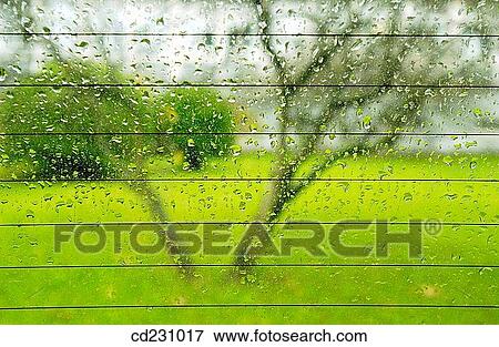 Rain on heated rear windscreen View Large Photo Image Stock Photo - Rain on heated rear windscreen. Fotosearch