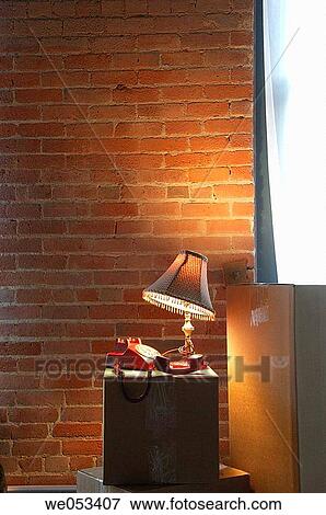 red telephone and lamp ontop of moving boxes View Large Photo Image Stock Photo - red telephone and lamp ontop of moving boxes. Fotosearch