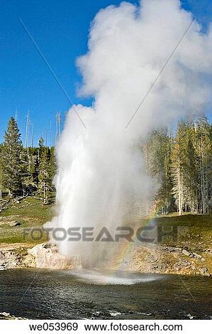 Riverside geyser in Yellowstone National Park. Wyoming. USA View Large Photo Image Stock Photo - Riverside geyser in Yellowstone National Park. Wyoming. USA. Fotosearch