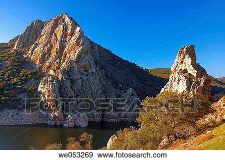 Salto del Gitano and Tagus River. Monfrague Natural Park (Biosphere Reserve). Torrej? n reservoir. Cßceres province. Extremadura, Spain View Large Photo Image Stock Photo - Salto del Gitano and Tagus River. Monfrague Natural Park (Biosphere Reserve). Torrej? n reservoir. Cßceres province. Extremadura, Spain. Fotosearch