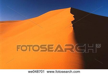 Sand dunes, desert. Sahara, Grand Erg Oriental. Algeria. November. View Large Photo Image Stock Image - Sand dunes, desert. Sahara, Grand Erg Oriental. Algeria. November.. Fotosearch