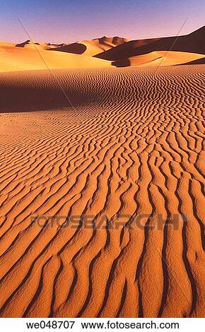 Stock Photo - Sand dunes, desert. Sahara, Grand Erg Oriental. Algeria. November.. Fotosearch