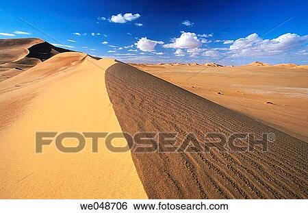 Sand dunes, desert. Sahara, Grand Erg Oriental. Algeria. November. View Large Photo Image Stock Photograph - Sand dunes, desert. Sahara, Grand Erg Oriental. Algeria. November.. Fotosearch