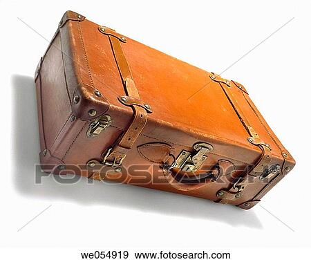 Stock Photo - Studio photograph of Old antique leather suite case, on white. Fotosearch