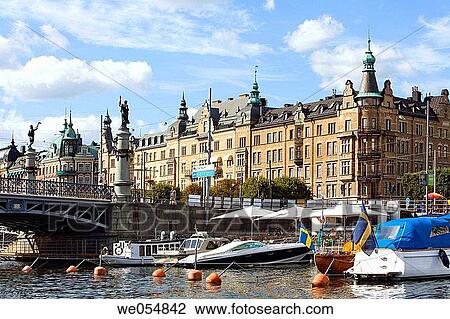 Stock Image - Sweden. Stockholm. Ships at Strandv? gen. Djurgardsbron bridge to Djurgarden Island.. Fotosearch