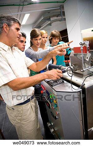 Stock Image - ue Country. Students, Turbine, Hydraulic machines laboratory, Department of Nuclear Engineering and Fluid Mechanics. Fotosearch