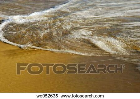 wave rolling onto sandy beach View Large Photo Image Stock Photography - wave rolling onto sandy beach. Fotosearch