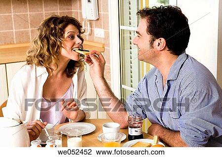 Stock Image - 30's, at-home, amusing, affection, 20's. Fotosearch