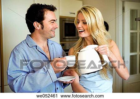 Stock Image - 30's, bond, at-home, affection, 20's. Fotosearch