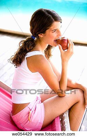 adolescence, biting, bite, apple, 20's View Large Photo Image Stock Photo - adolescence, biting, bite, apple, 20's. Fotosearch