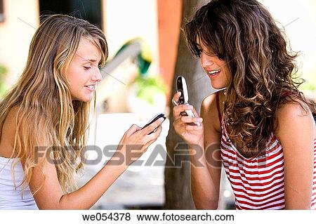 adolescence, calling, amusement, addiction View Large Photo Image Stock Photo - adolescence, calling, amusement, addiction. Fotosearch