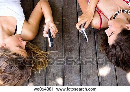 adolescence, cell phone, addiction View Large Photo Image Stock Image - adolescence, cell phone, addiction. Fotosearch