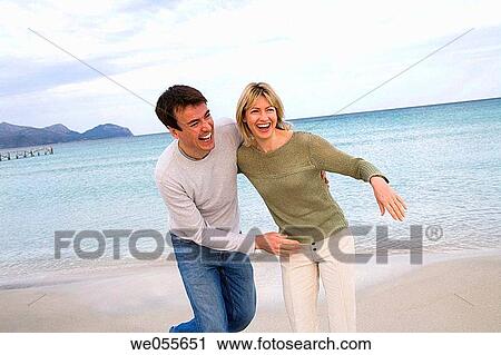 affection, beach, autumn, amusement, 30's View Large Photo Image Stock Image - affection, beach, autumn, amusement, 30's. Fotosearch