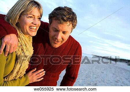 affection, beach, autumn, amusement, 30's View Large Photo Image Stock Photography - affection, beach, autumn, amusement, 30's. Fotosearch