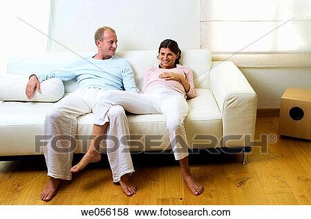 affection, belly, barefoot, at-home, 30's View Large Photo Image Stock Photo - affection, belly, barefoot, at-home, 30's. Fotosearch