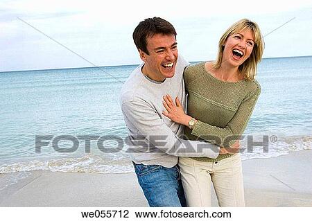 affection, bond, beach, amusement, 30's View Large Photo Image Stock Image - affection, bond, beach, amusement, 30's. Fotosearch