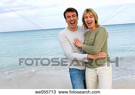 affection, bond, beach, amusement, 30's View Large Photo Image Stock Image - affection, bond, beach, amusement, 30's. Fotosearch
