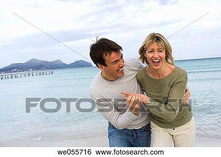affection, bond, beach, amusement, 30's View Large Photo Image Stock Photograph - affection, bond, beach, amusement, 30's. Fotosearch