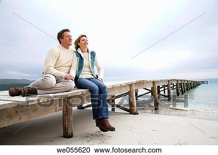 affection, bond, beach, autumn, 30's View Large Photo Image Stock Image - affection, bond, beach, autumn, 30's. Fotosearch