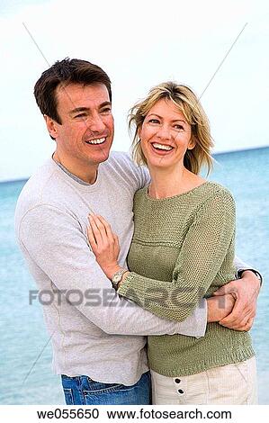 affection, bond, beach, autumn, 30's View Large Photo Image Stock Image - affection, bond, beach, autumn, 30's. Fotosearch