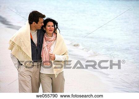 Stock Image - affection, bond, beach, autumn, 30's. Fotosearch